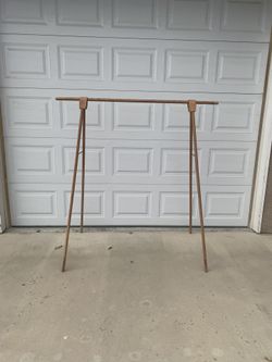Free--standing clothes rack $20