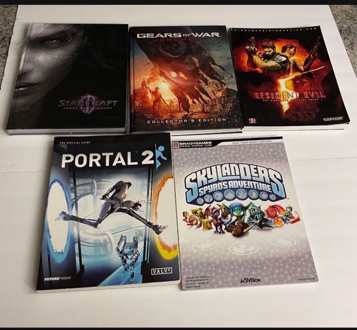 Strategy guides Video Game Gears of War, New Starcraft, Portal 2, Resident Evil, Skylanders $5 Each