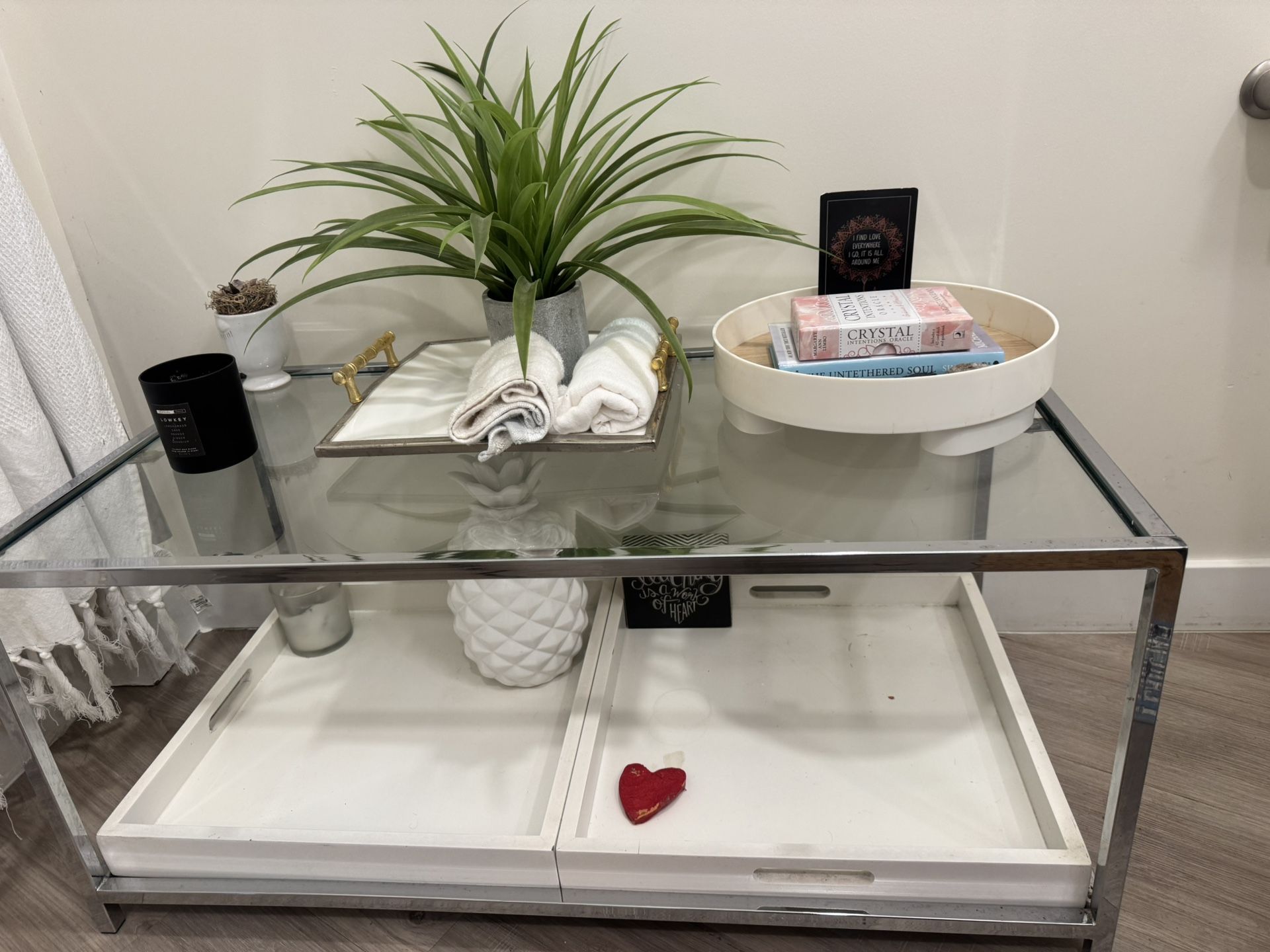 Glass coffee table with pull out white trays 