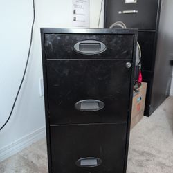 Small Black Filing Cabinet With Folder's 