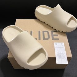  Yeezy Slide Kids Bone/Bone   Size - 13K .  Proof of purchase.   