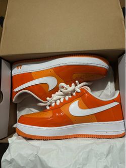 Orange Nikes size 12