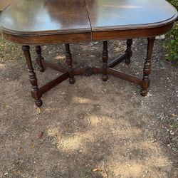 Wooden Oval dining table With 4 Chairs.  