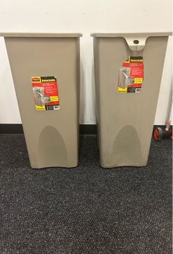 Two tall 23 Gallons Rubbermaid Trash Containers