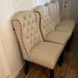 Gray Leigh tufted dining room chairs