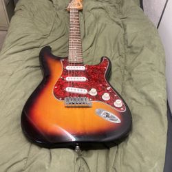 squier strat by fender electric guitar