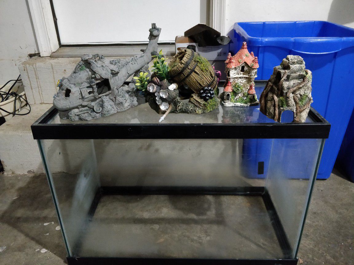 20 Gallon fish tank substratr, decor, some other miscellaneous stuff.