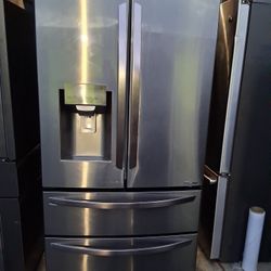 LG brand 4-door refrigerator, 36 wide by 68.5 high and 29 deep.