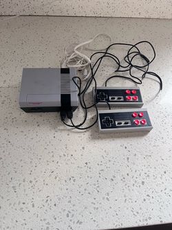 Nintendo Entertainment System (NES) Console with Two Controllers