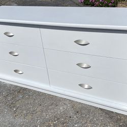Dresser white big horizontal  Six easy sliding drawers 13 1/2 x 28 1/4 x 5“ deep  And there’s a lot of leeway to go even deeper Satin silver handles  