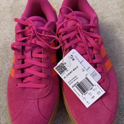 Adidas Women’s vibrant pink and orange Sneakers