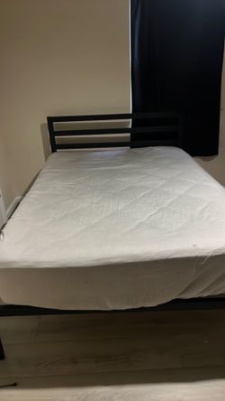 Bed with mattress
