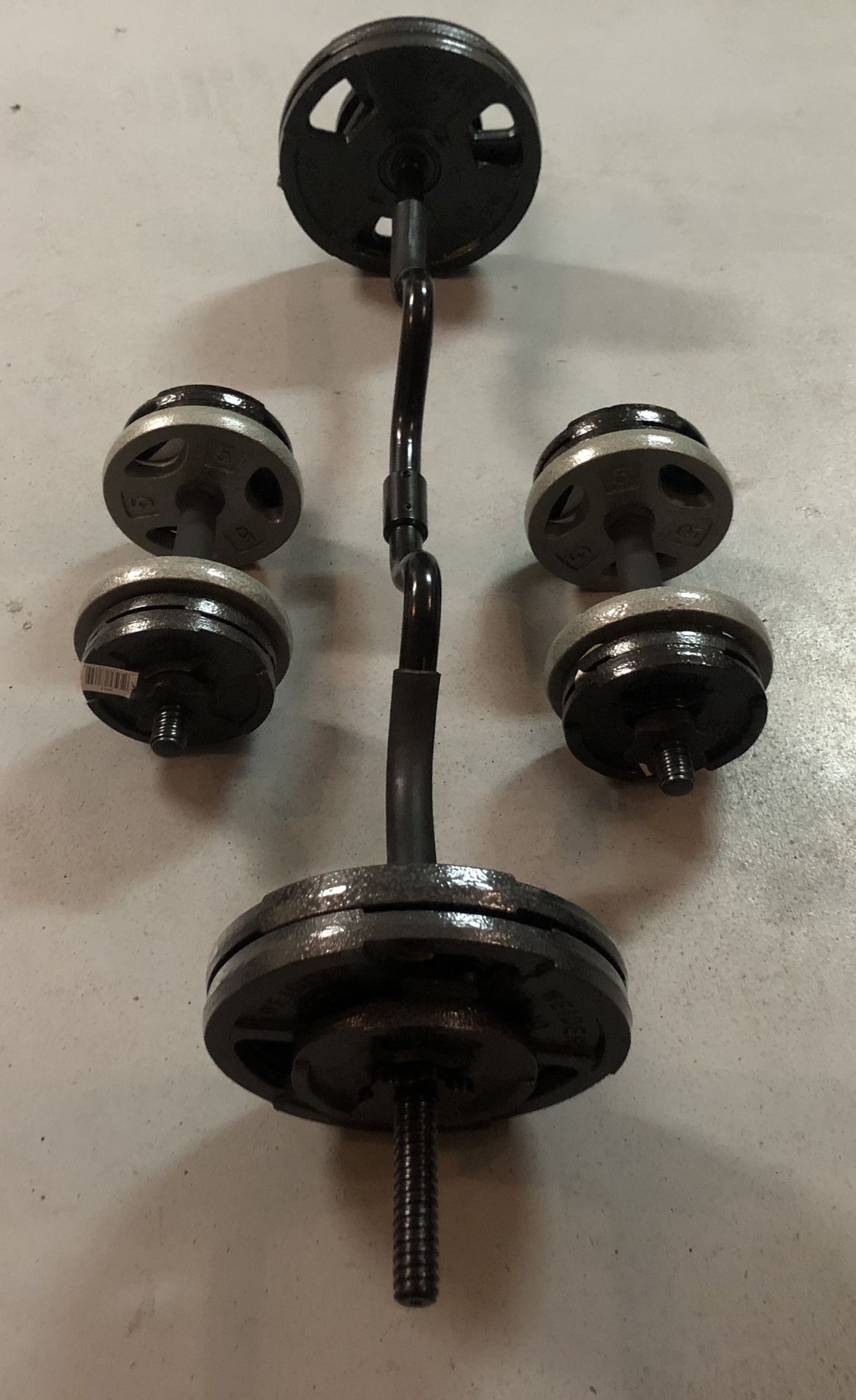 Brand new standard steel weight plates and combo curl bar, with a set of adjustable dumbbell handles!! All new!! 85lbs of weight weight plates!