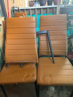 Orange dining chairs