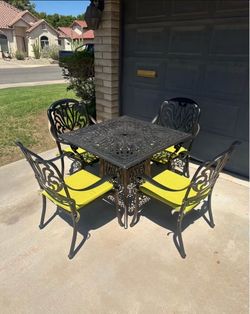 Patio set. Outdoor furniture. Table and chairs. Excellent condition.