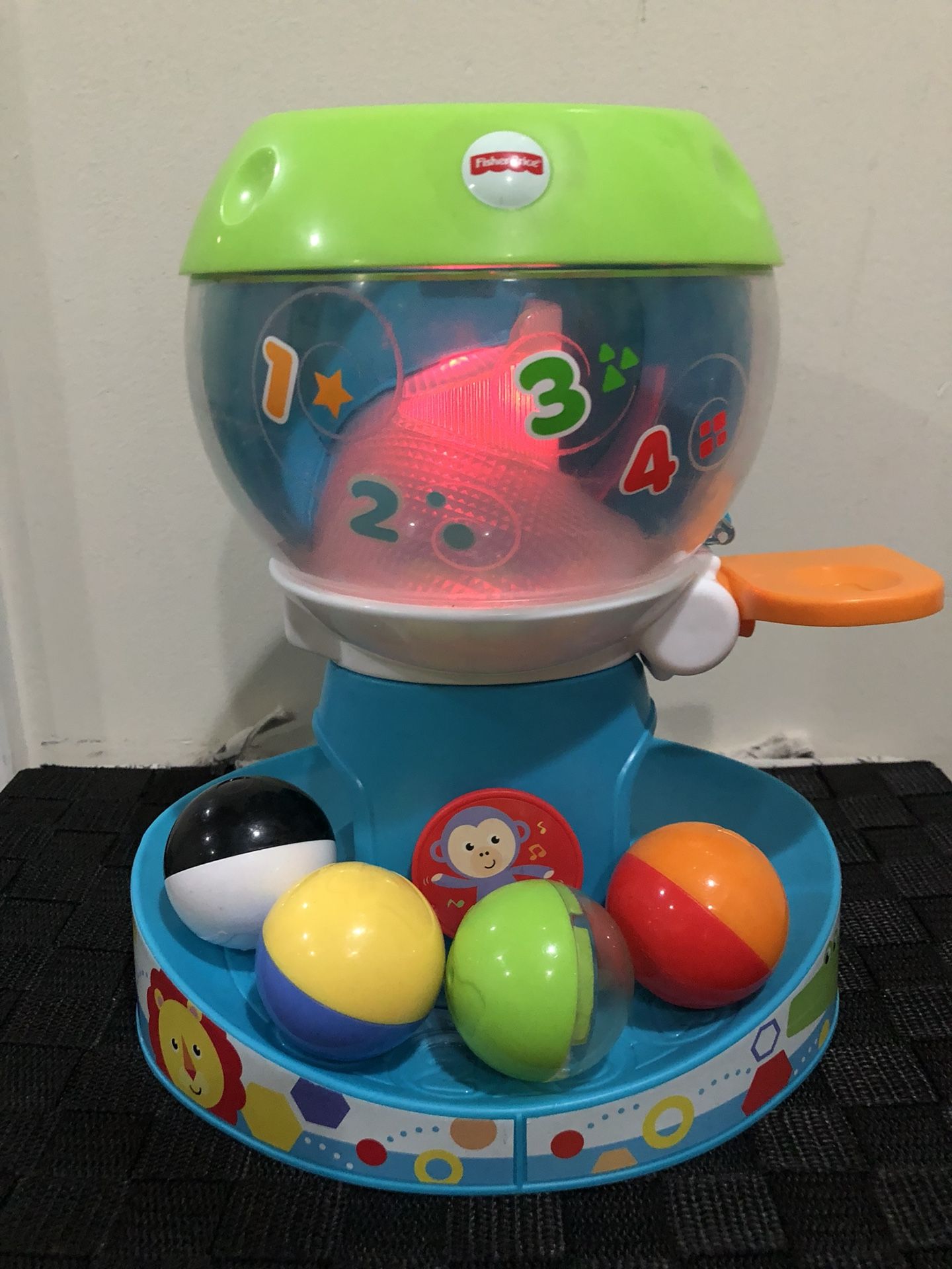 Fisher price swirl sales n tunes gumball