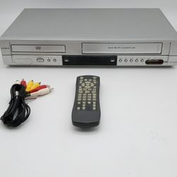 Insignia VCR/ DVD Player with Remote And Cable. ( The Top Is All Scratched Up) Works Fine.