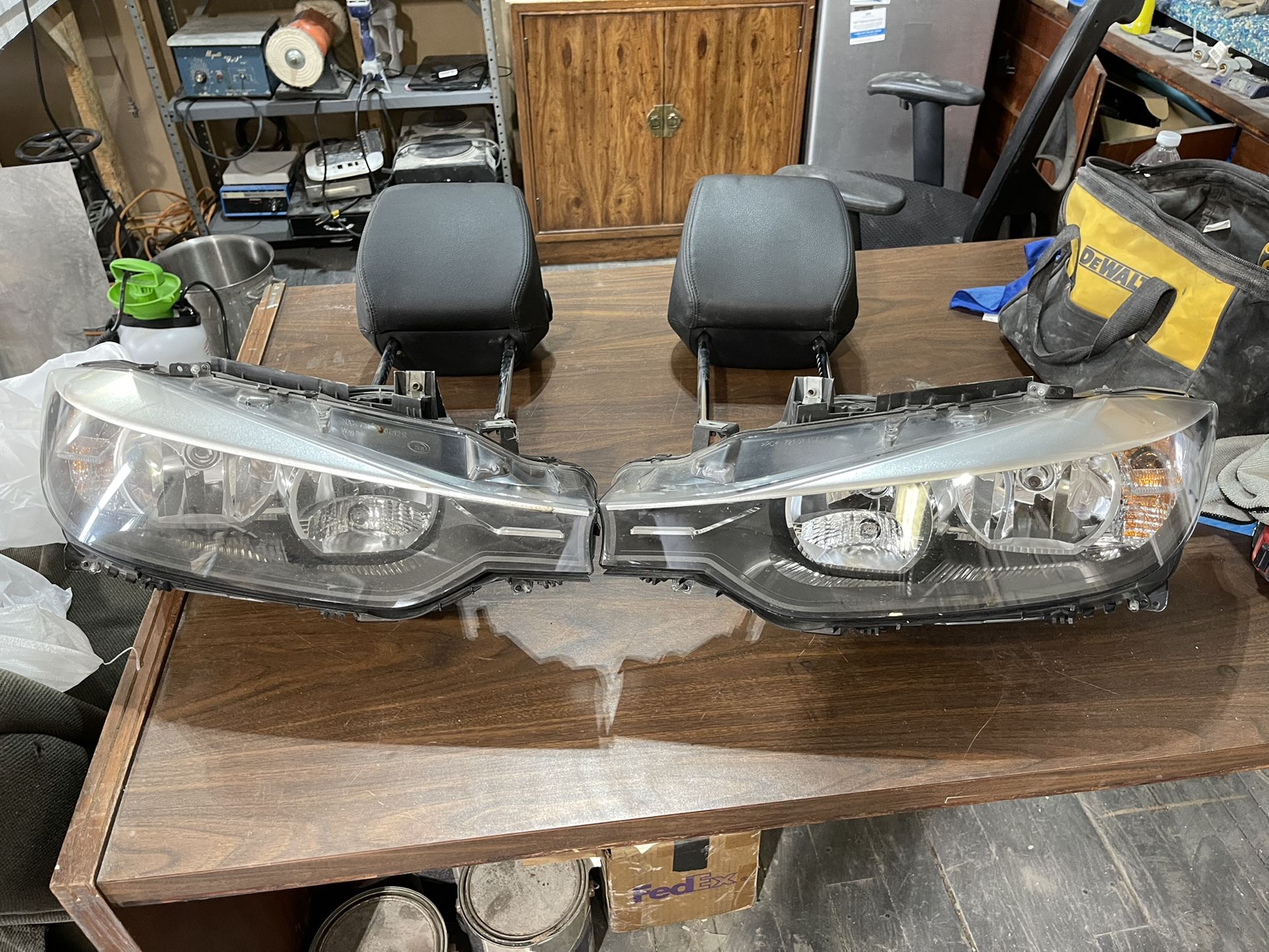 semi new bmw 325 headlight has not broken and headrest driver seat and ride