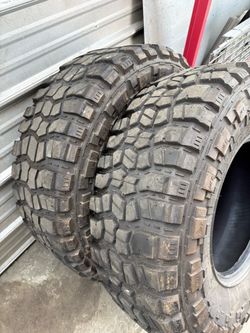 4 kenda M/T2 Tires 1 goodyear