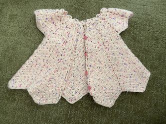 Knitted baby girl clothes