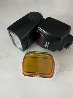 Nikon Speedlight SB-700 shoe-mount flash.