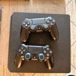 PS 4 with 2 controllers & 7 games