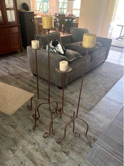 Rustic wrought iron candle stands