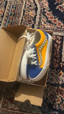 Vans blue and orange with a black and white strip