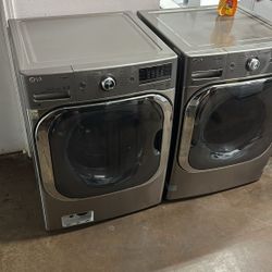 LG SET STEAM WASHER AND ELECTRIC DRYER STAINLEES STEEL 