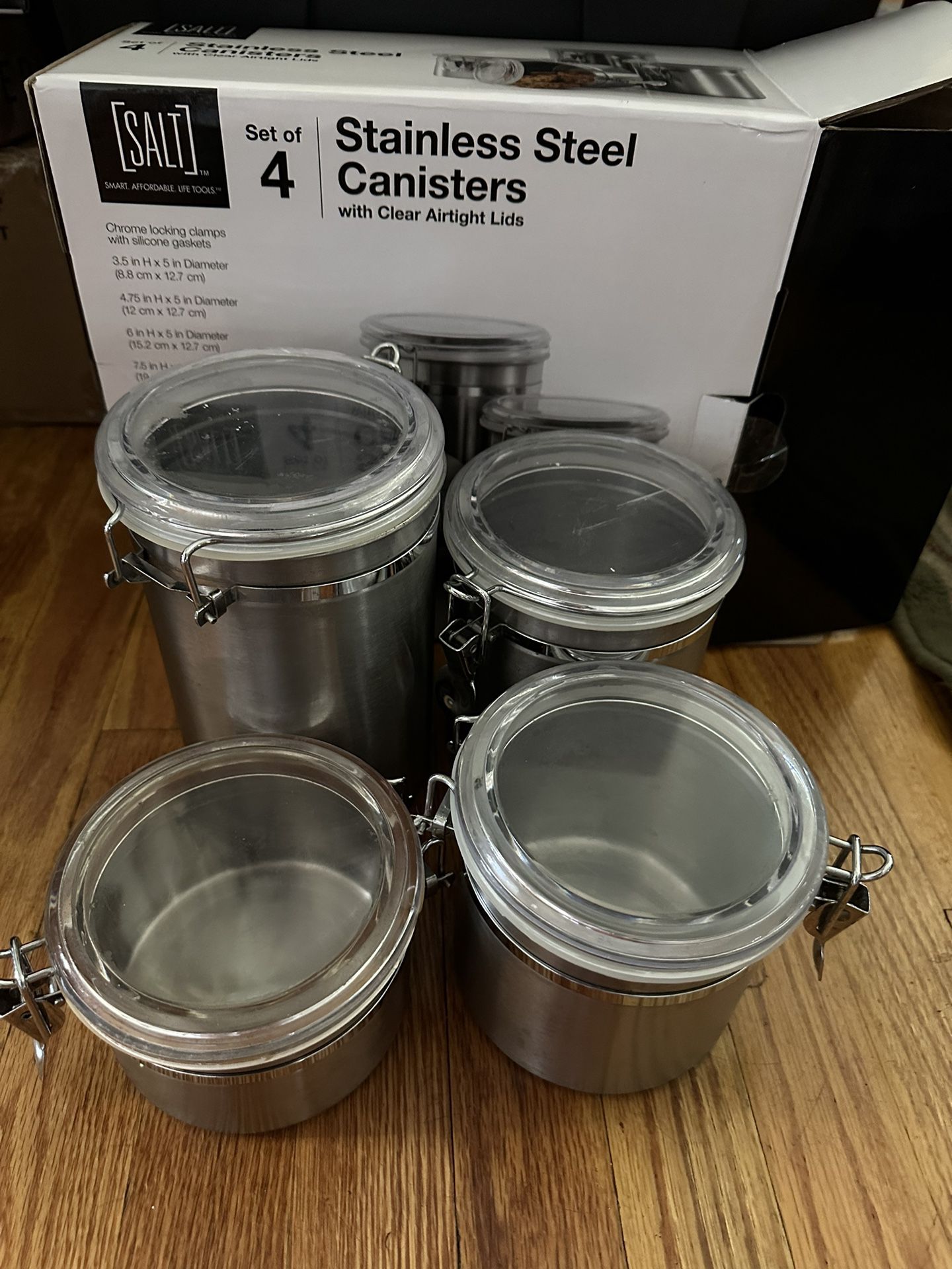 Four Stainless Steel Canisters
