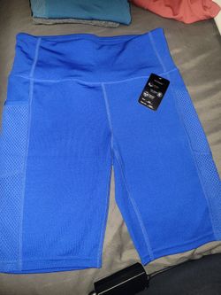 NEW WITH TAG WORKOUT COLOR: ROYAL BLUE  SHORTS WITH POCKETS  SIZE: S/M  For $10 