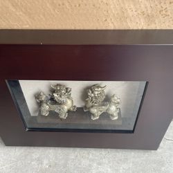 Wooden Shadowbox With Dragon Foo Dog Sculptures. Linen backdrop. 22”Wx16”1/2Hx3”D Excellent Condition $40 Firm On Price