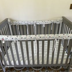 DELTA Adjustable Grey Crib with Mattress