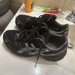 Brand new Black and silver asics Size 10