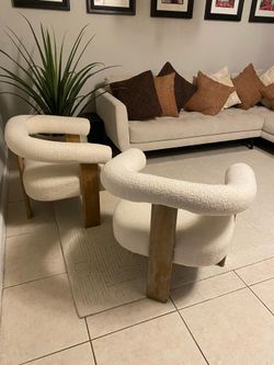 sculpted boucle accent chair set of two $400
