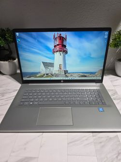 NEW HP 17-cn0001tg is a budget-friendly 17.3-inch laptop built for basic, everyday tasks. Powered by a quad-core Intel Pentium Silver processor, it is