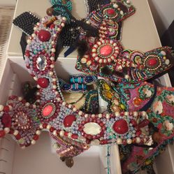 A box of handmade unique expensive pieces of gems and other natural and artificial stones