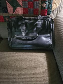 Leather brief case.