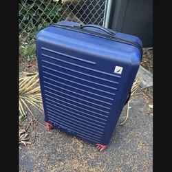 LOW PRICE MOVING- LARGE $450 + TAX NAUTICA CHECKED LUGGAGE SPINNER