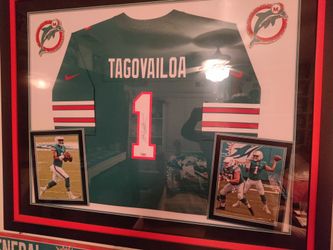 Tua with Signature.