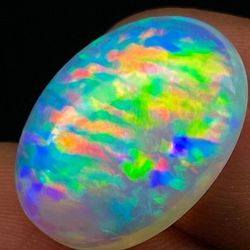 1.75 Cts. Harlequin Rain Ow Flash Opal Oval Cab