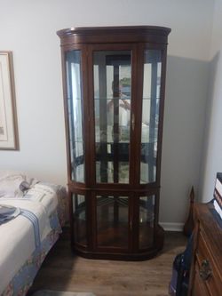 Five shelf curio cabinet for sale!