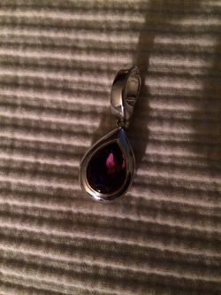 Purple Faceted Stone Set in Silver/ Gold Tone Pendant