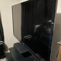 65” Sharp TV + Free Stand (optional)