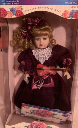Genuine Porcelain Doll $80