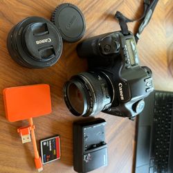 Canon 5D classic with EF 28mm 1.8 and 50mm 1.8 lens