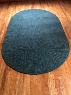 Oval braided rug