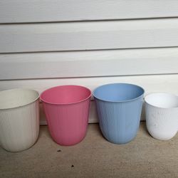 4 Beautiful Plastic Flowers Pots . $40 For All 