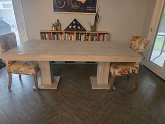 Unique wood dining table. White washed. Seats 6.