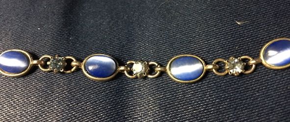 Bracelet blue moon stone type stone and round clear blue stones